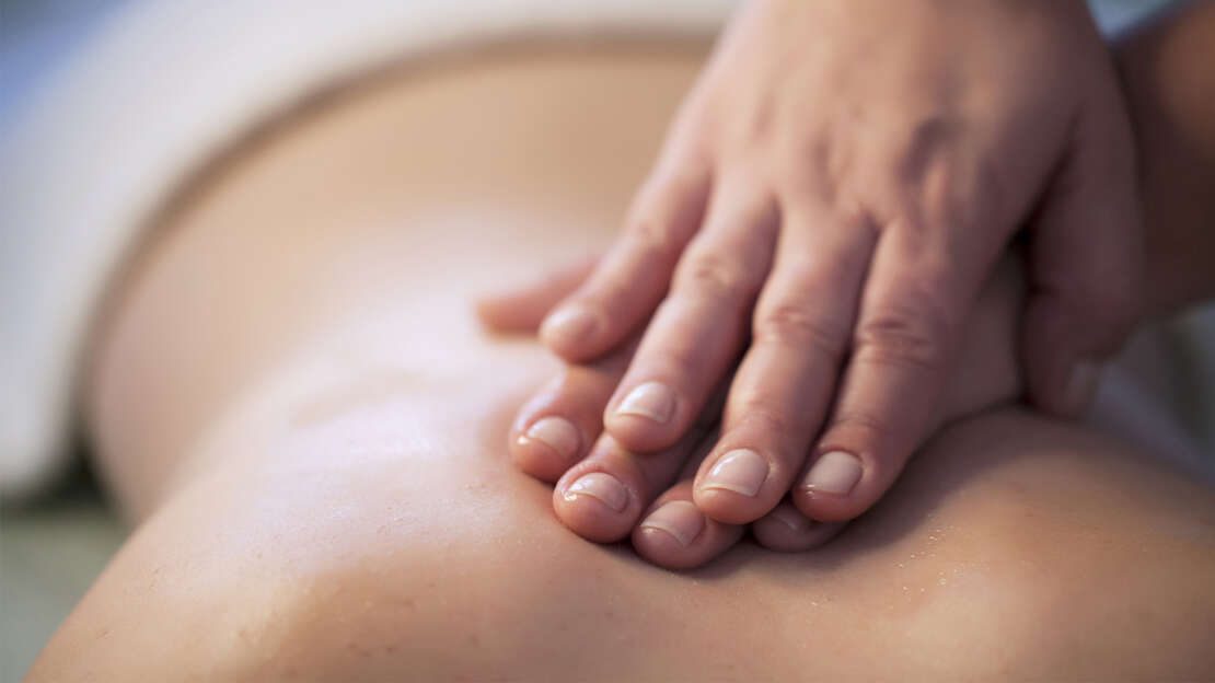 A client relaxing during a massage